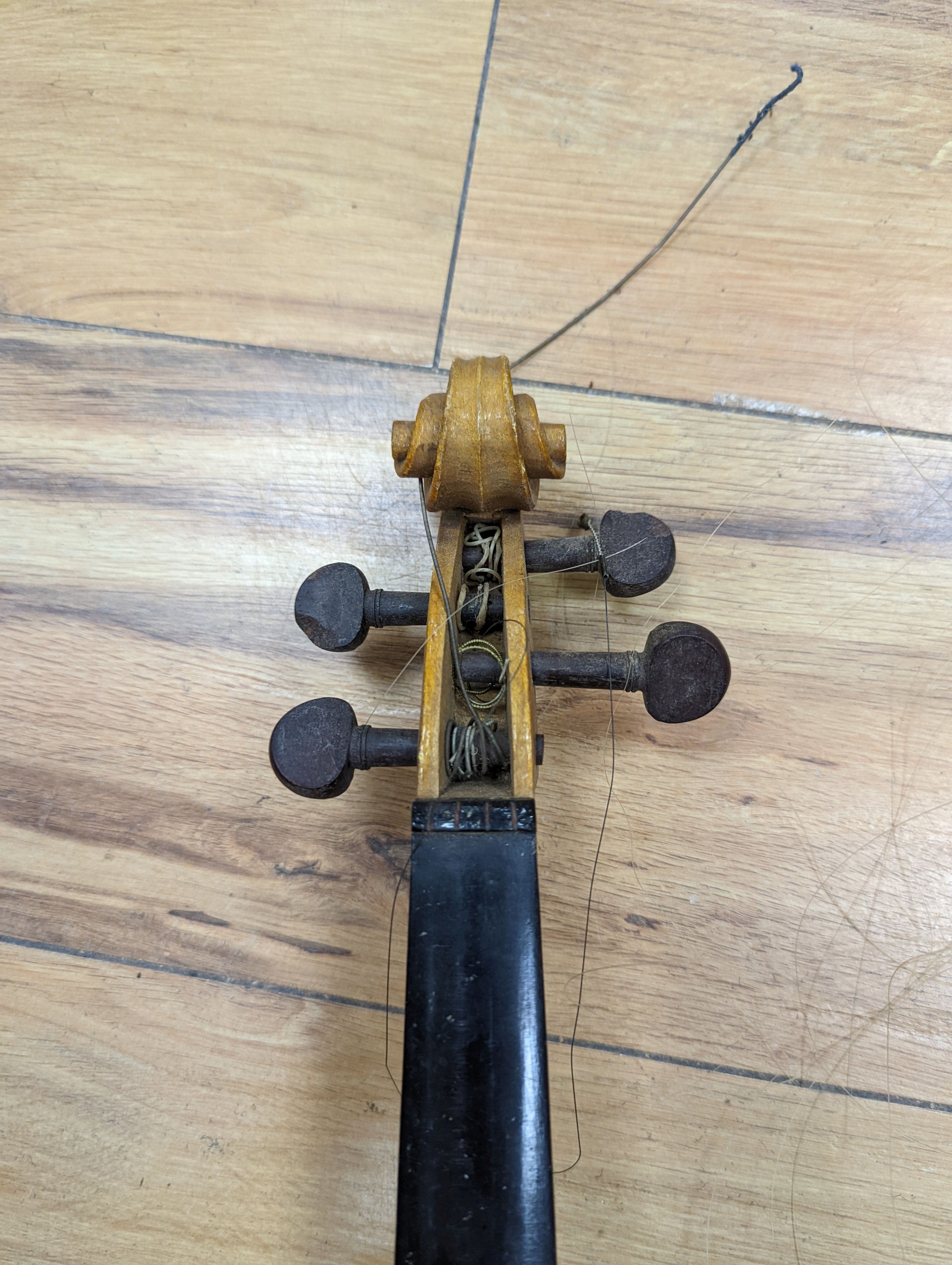 A violin and bow, various records etc